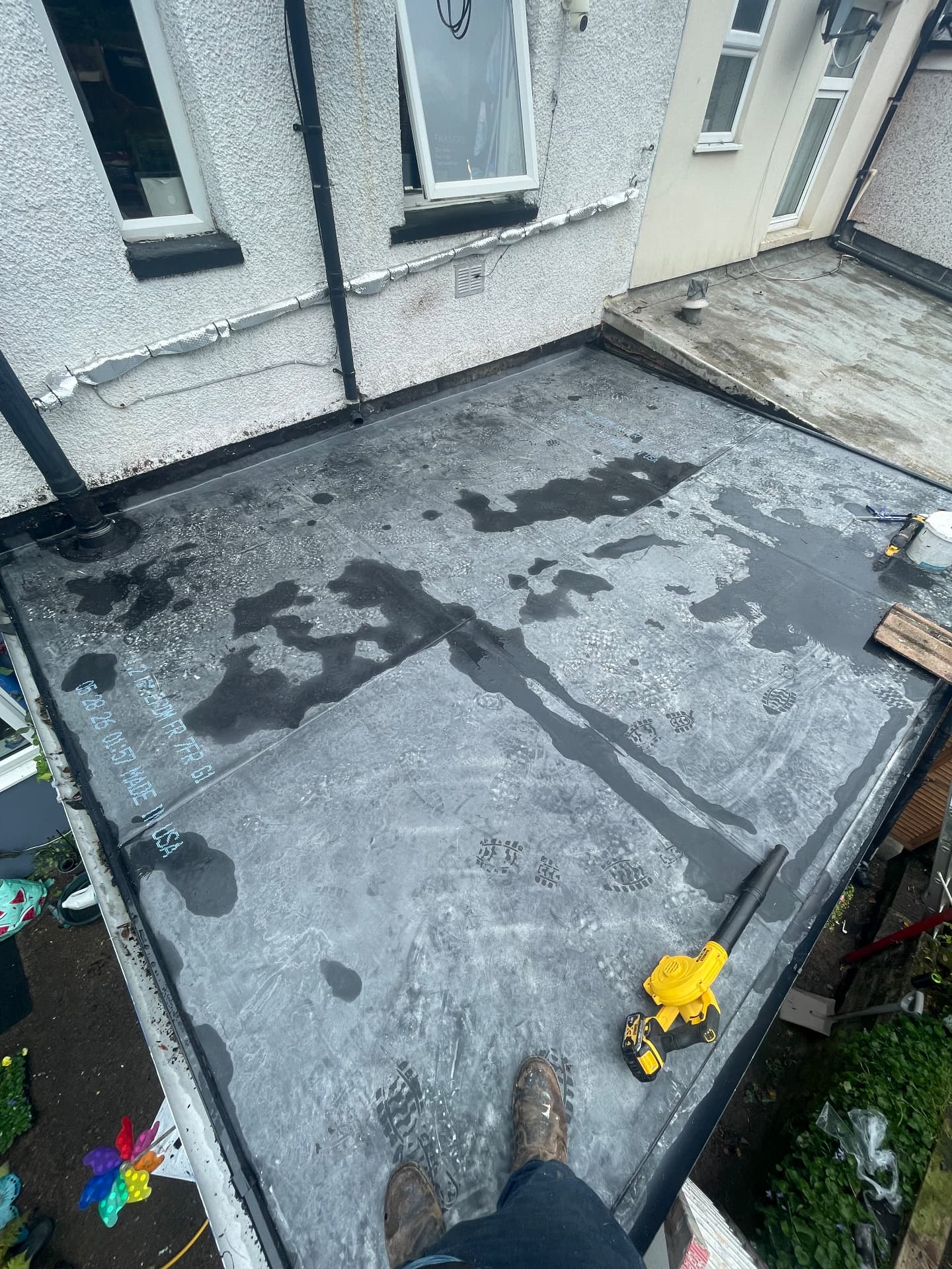After — EPDM rubber roof complete